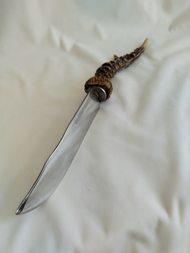 Vintage knife with deer horn handle