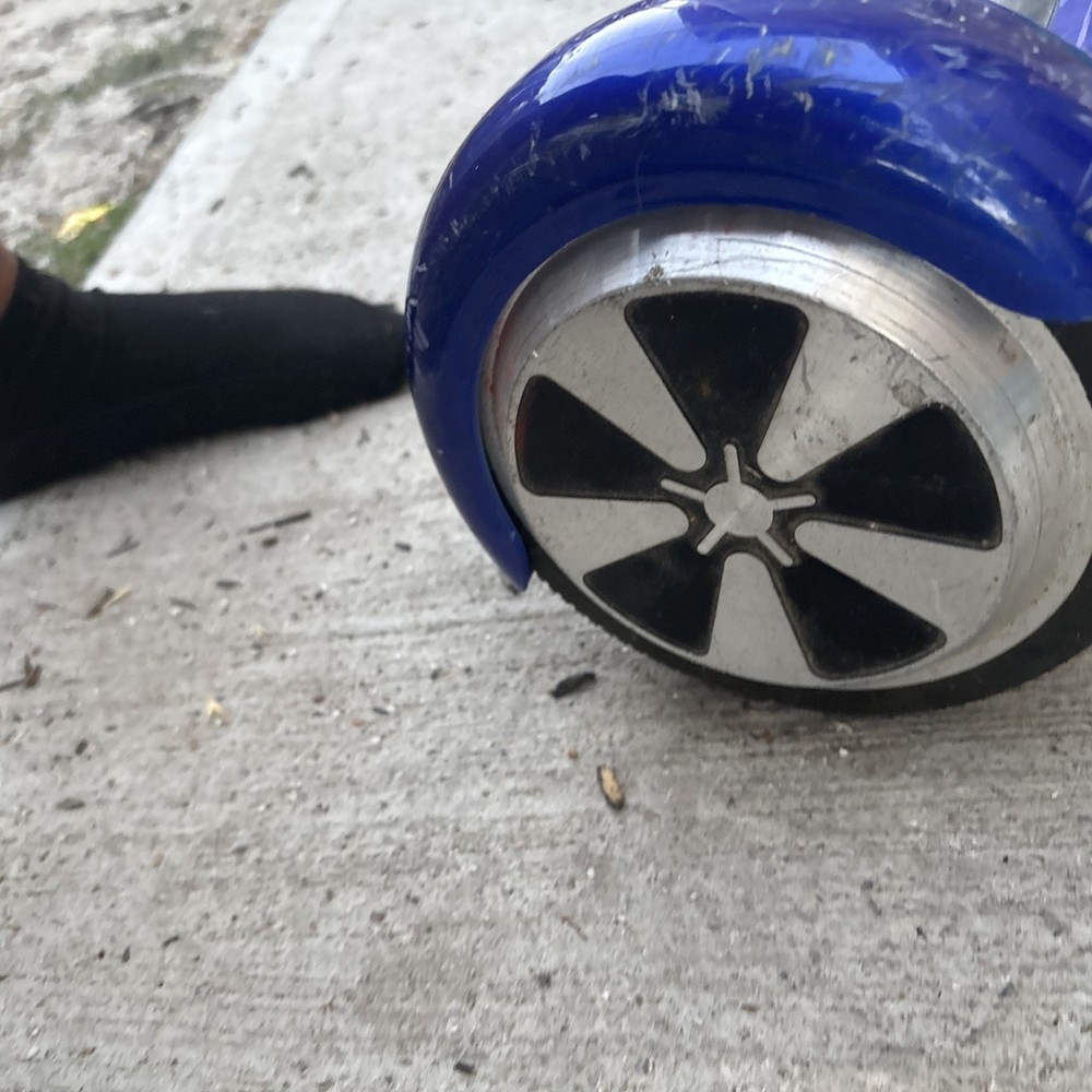 Good Working Hover Board (used) With Charger purple medium sized hover board