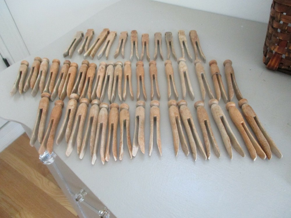 Antique Primitive wood clothes pins. Knobs on top.Two different styles. 46 total