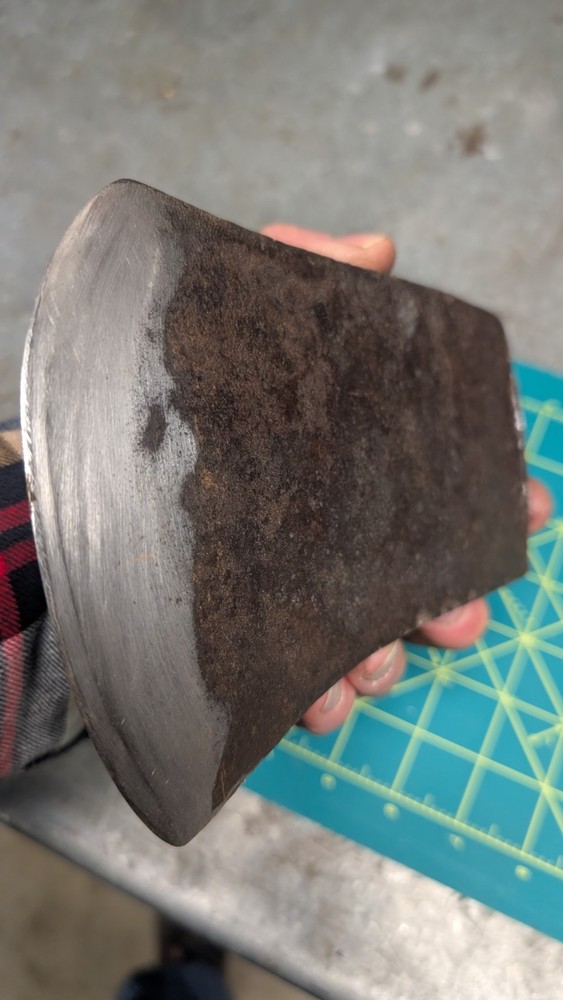 Kelly works axe and tool