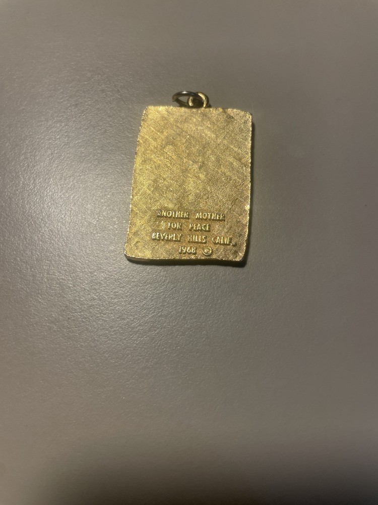 anti-Vietnam War peace pendant