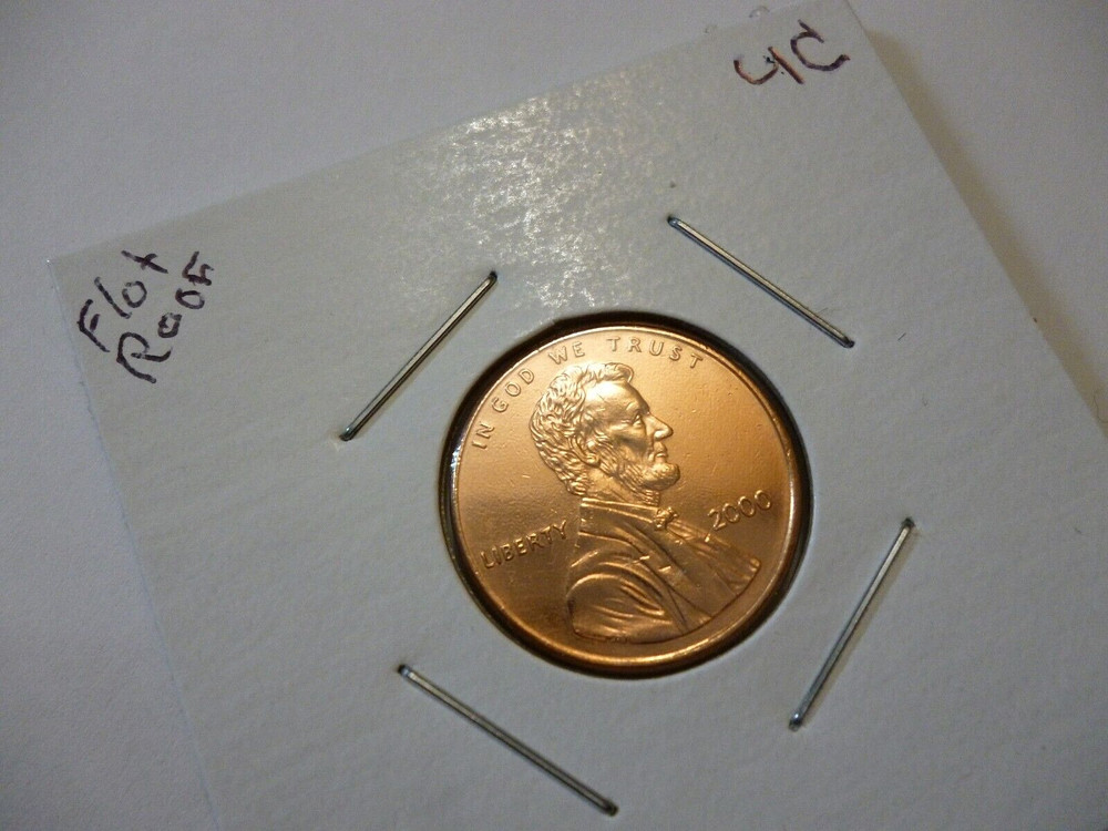 2000 penny, Floating roof coin