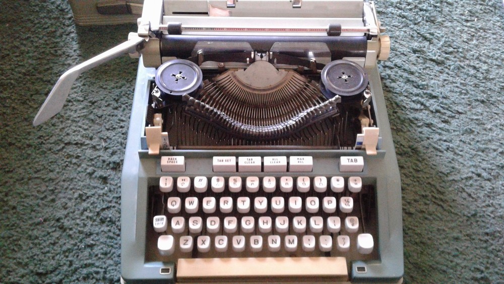 Hermes Typewriter with case and key