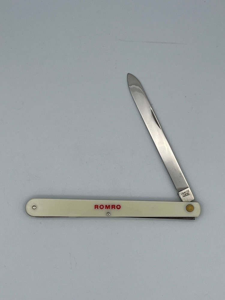 Colonial Straight Folding Knife White Plastic Handle w/ Romro Written On Handle