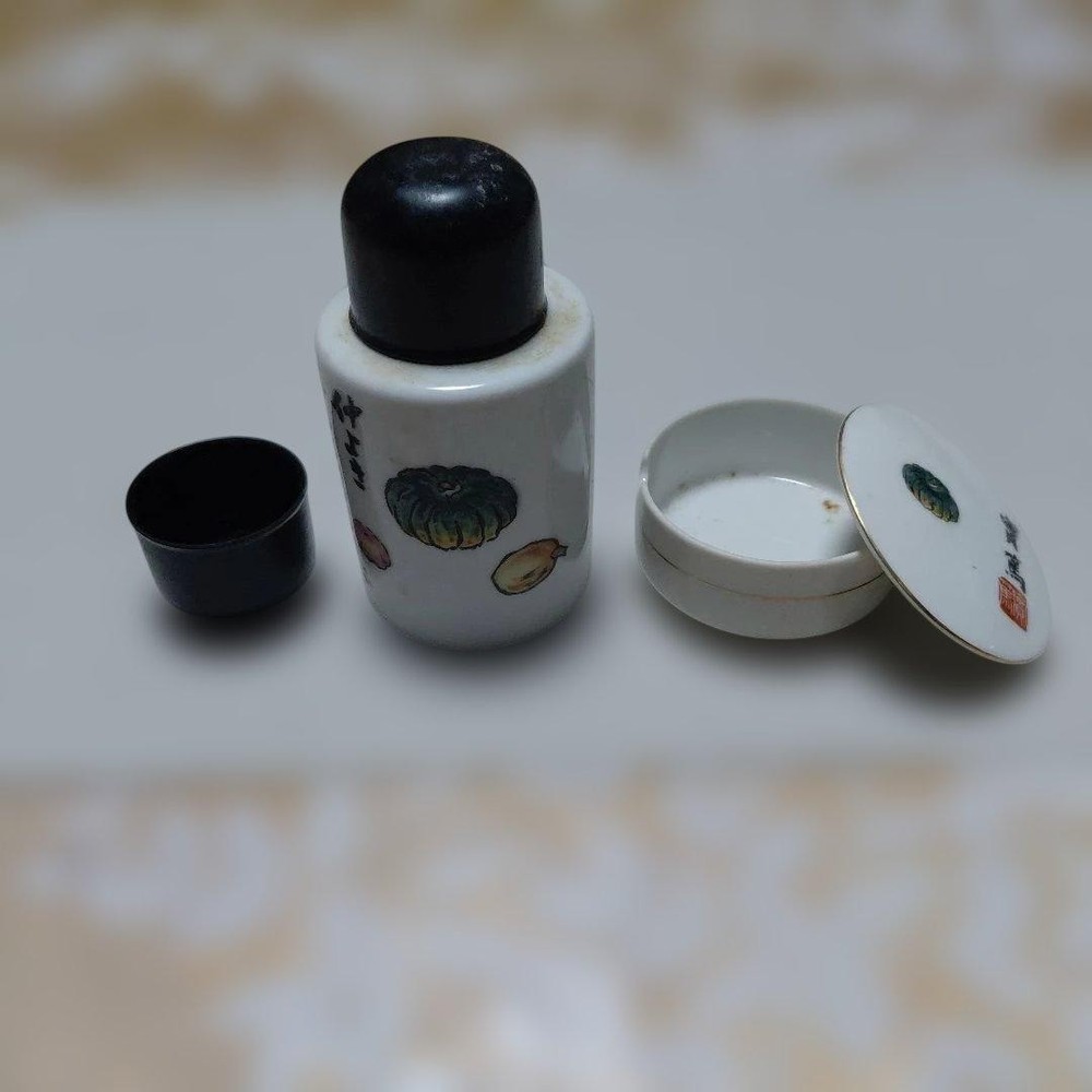 Ceramic sake bottle and cup set