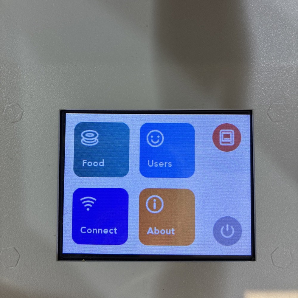 TOYBOX 3D Printer with white printer food.