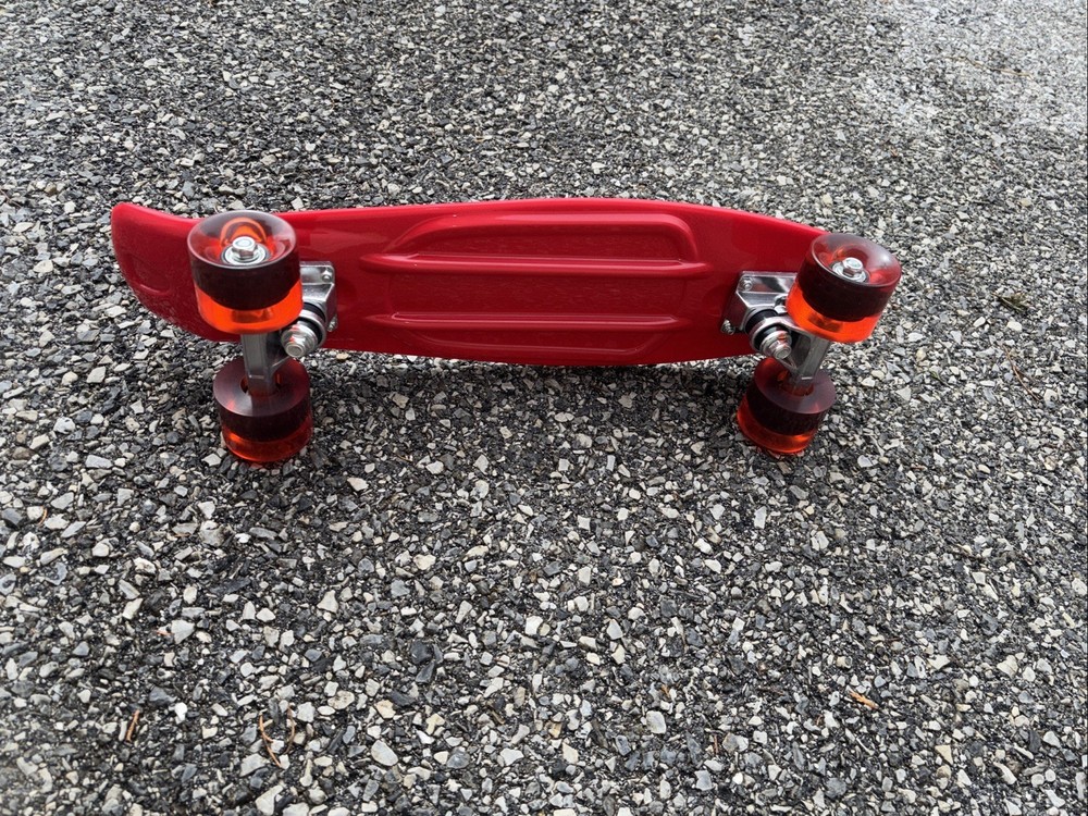 Red Plastic Skateboard With Red Rubber Wheels