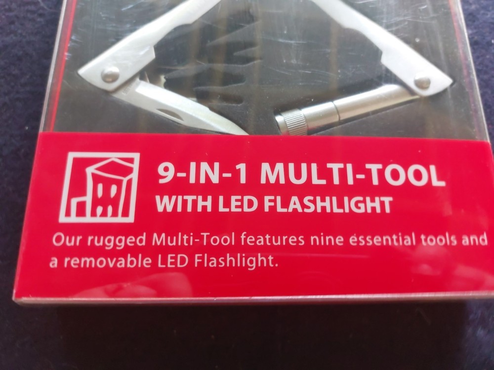 Brookstone® 9-in-1 multi-tool with flashlight pocket size tool NIB