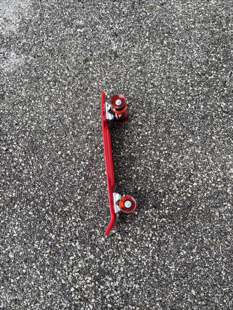 Red Plastic Skateboard With Red Rubber Wheels