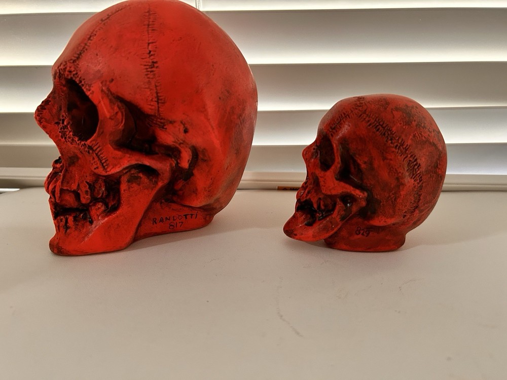 2 EA. RANDOTTI ORIGINAL LARGE & MEDIUM FLUORESCENT RED SKULLS STILL GLOW