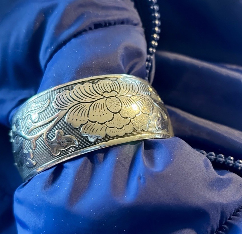 cuff bracelet with floral engraving