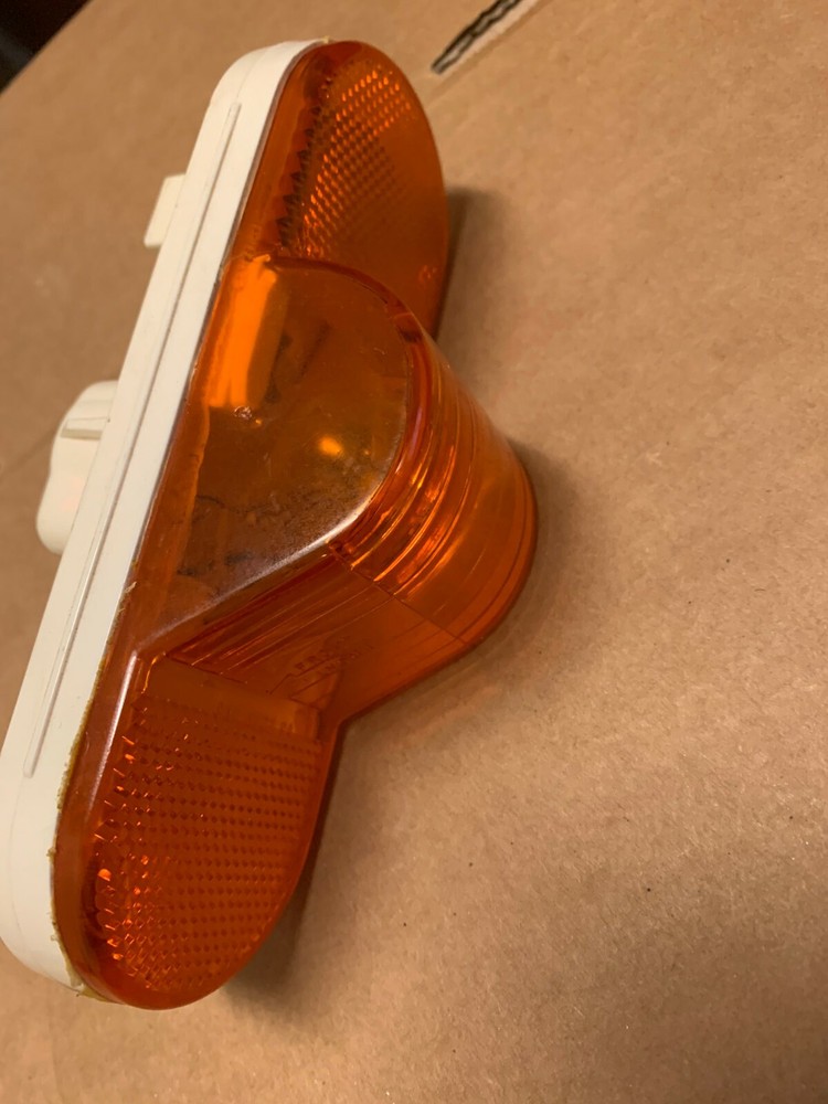 ONE GENUINE SIGNAL-STAT ORANGE STOP TURN TAIL LIGHT 4073
