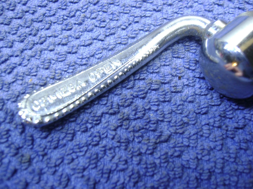 Used Front Ofmega older style road skewer quick release, missing adjuster end