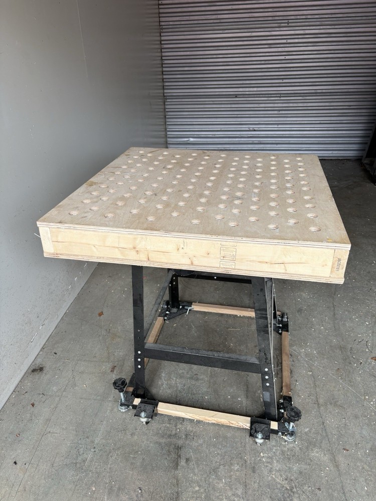 Custom wood working bench with tube for vacuum