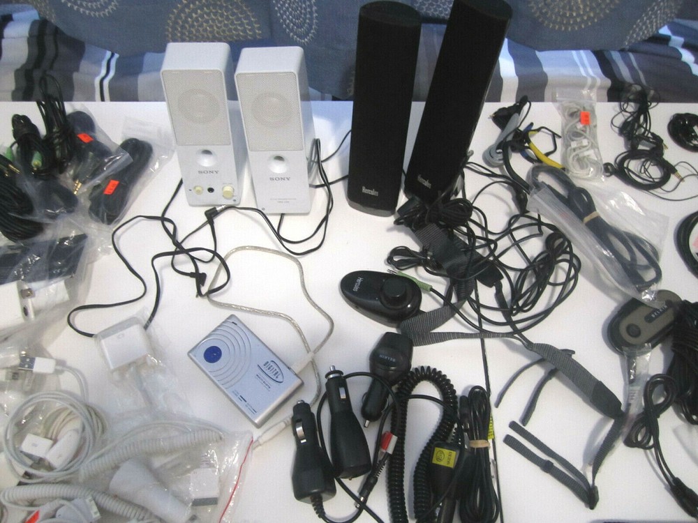 Lot of electronics, Assorted camera straps , Assorted cables and more ZZ