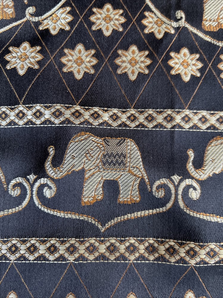 Table Runner With Gold Elephants On Black Backdrop
