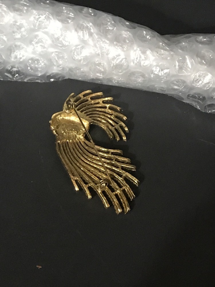 m jent brooch Sign