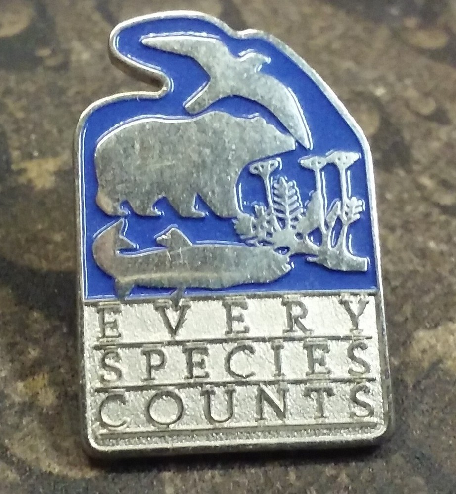 Every Species Counts pin badge