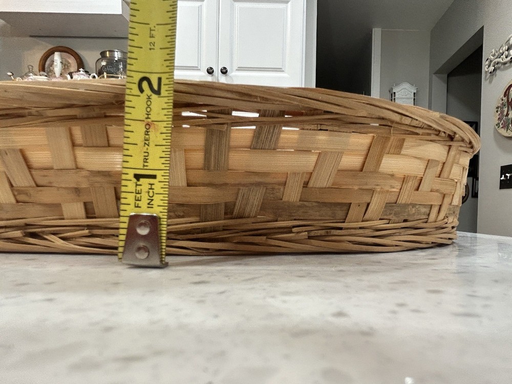 Light Colored Oval Wicker Basket Metal Trivet