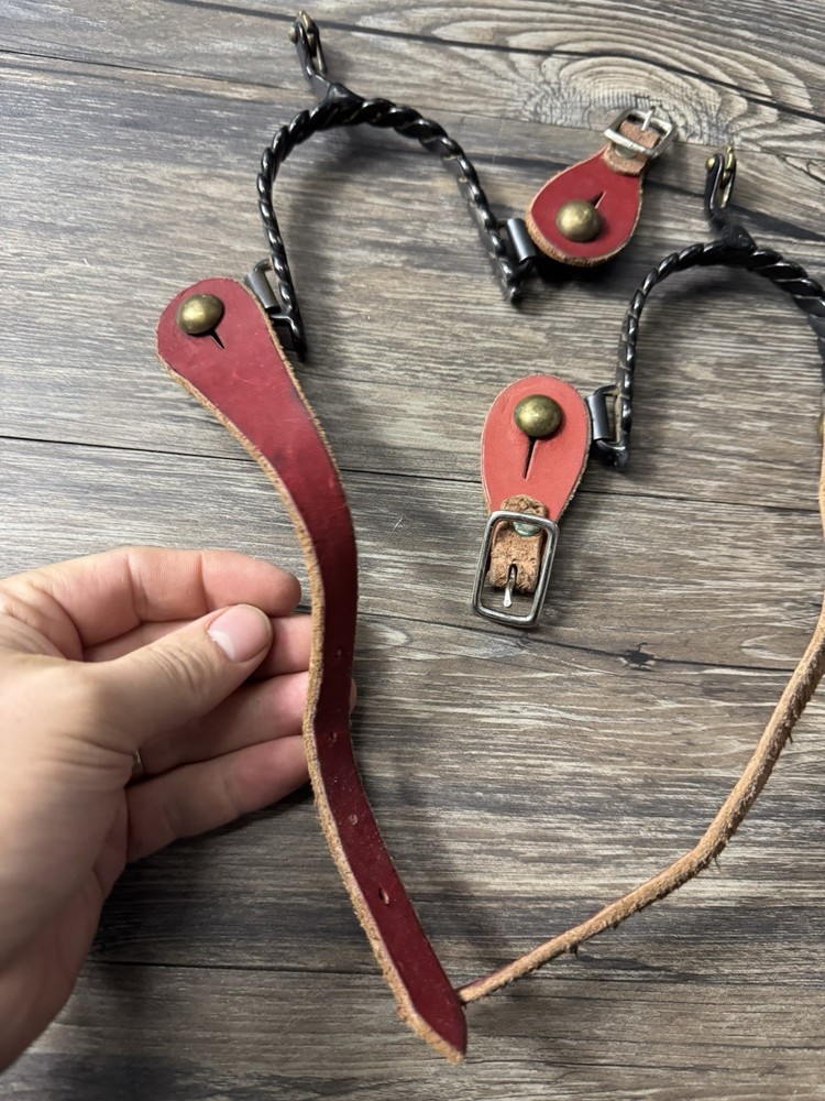 Black Steel Twisted Spurs Red Leather