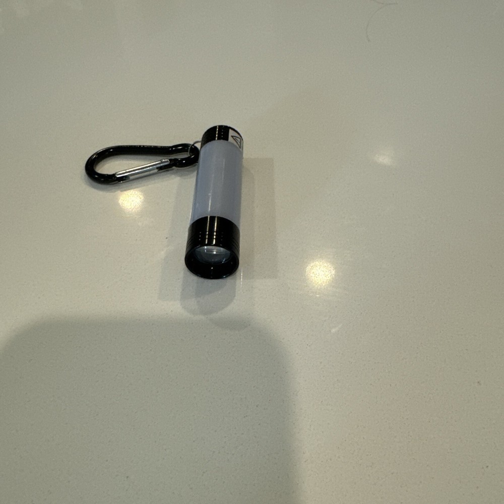 NYCC 2024 Britbox “The Passenger” Comic Con Exclusive Flashlight Keychain