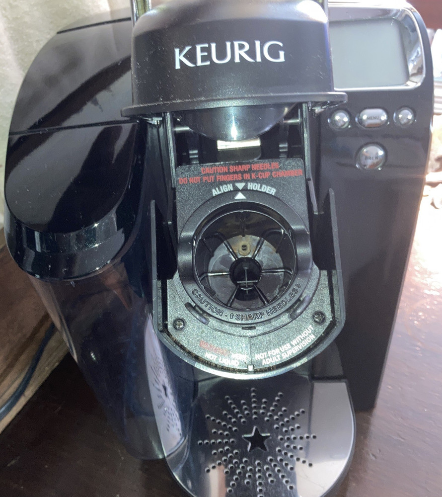 Keurig Coffee Maker, great working condition. Tested, cleaned. Black and chrome