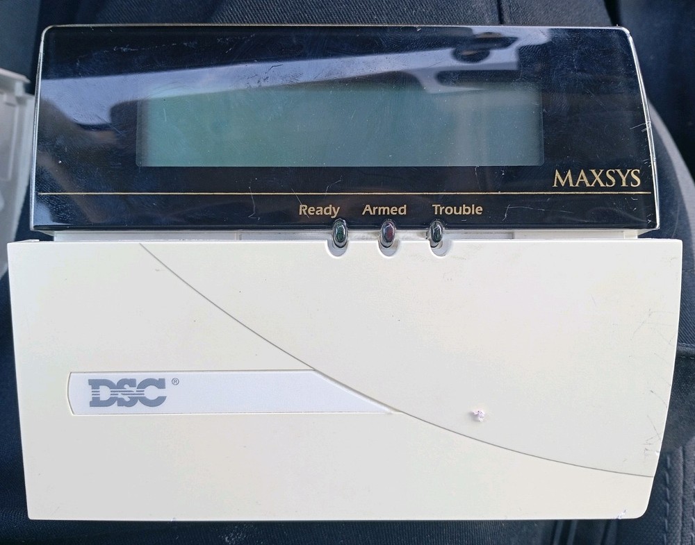 DSC MAXSYS LCD keypad with panic buttons