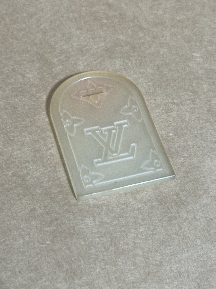 LOUIS VUITTON SILICONE POIGNAT TAG