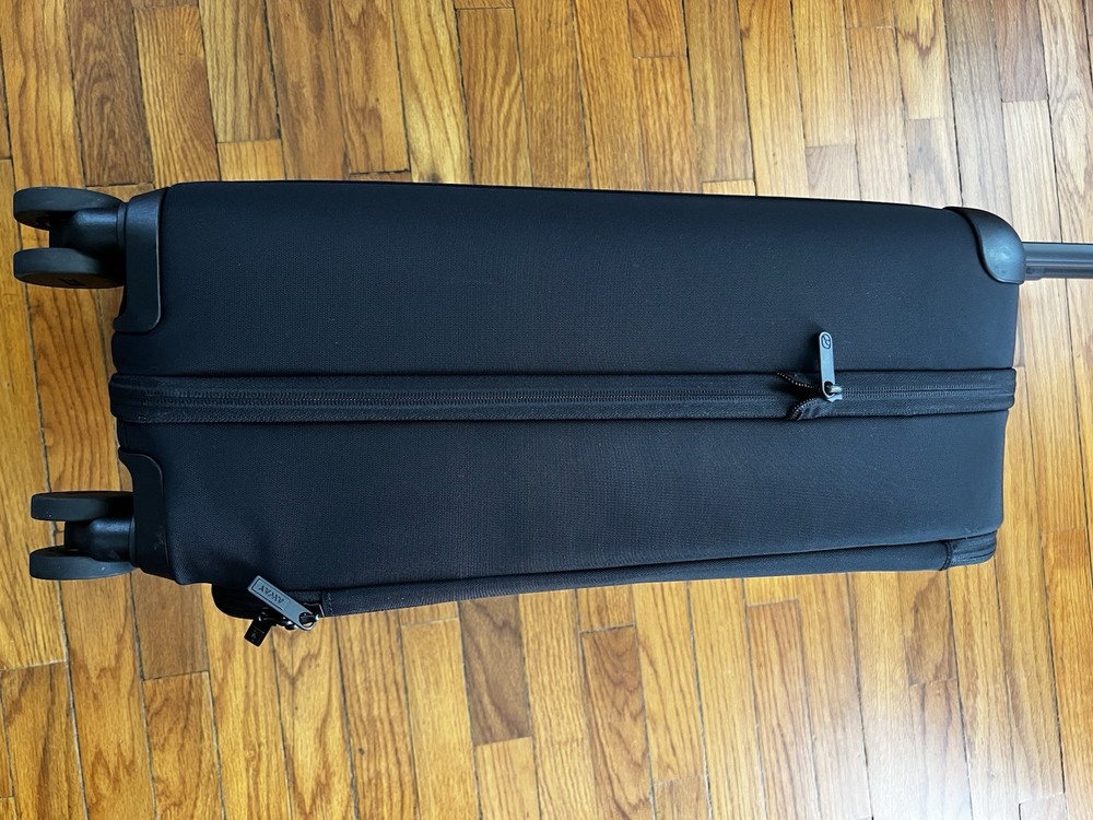 Away Softside flex carry on Expendable Luggage Black