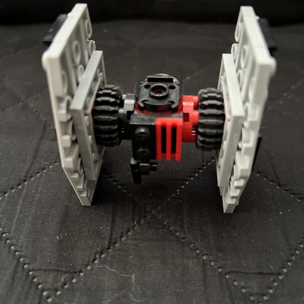 star wars tiny lego tie fighters and Madalorian ship