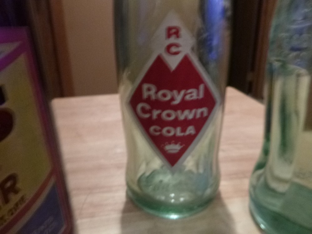 FIVE NICE VINTAGE POP BOTTLES