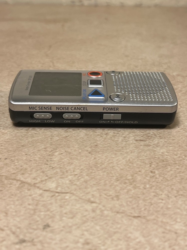 Olympus DP-201 digital voice recorder.