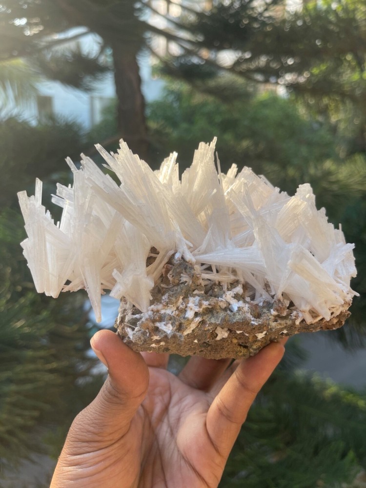 Glossy scolecite spray on basalt matrix