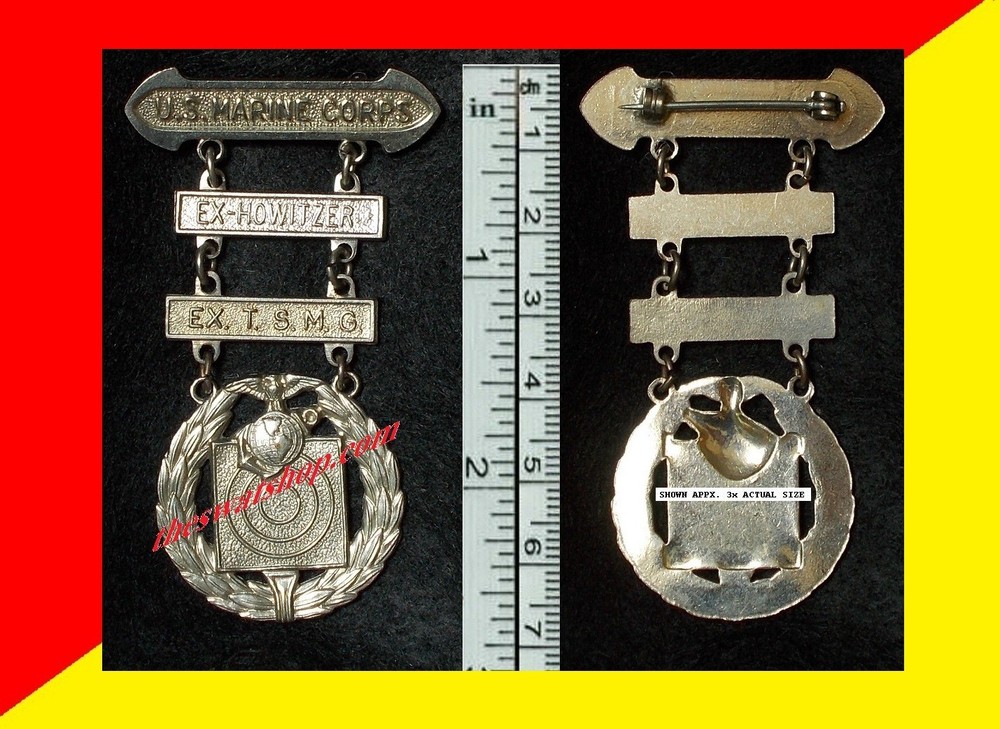 USMC BASIC QUALIFICATION BADGE EX-HOWITZER & EX.T.S.M.G. Roll-Catch