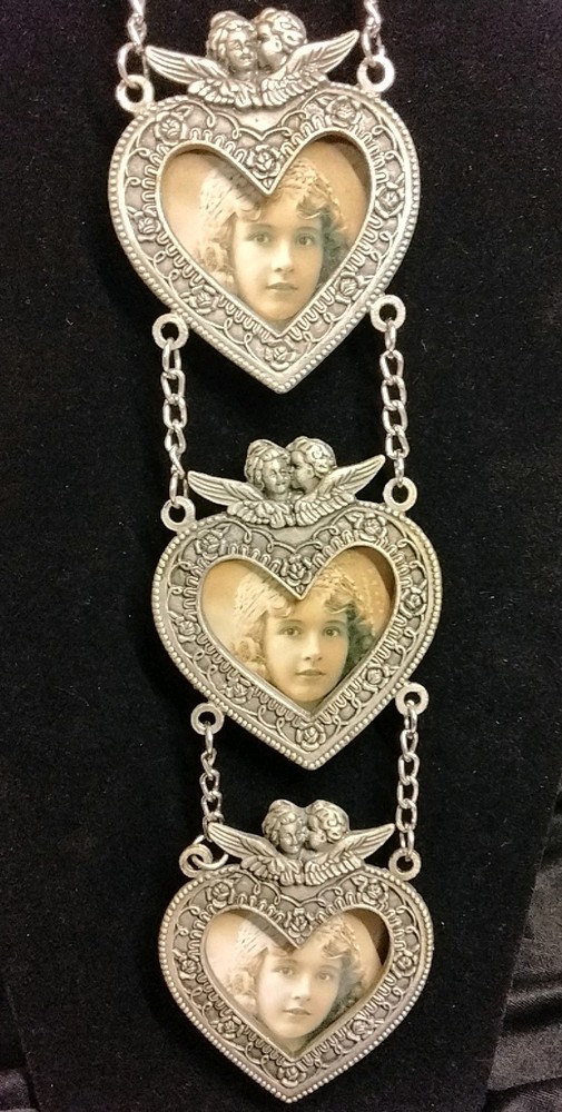 Three Silver/Pewter Frames Connected by Chains. Length 10"  Each Frame 3"