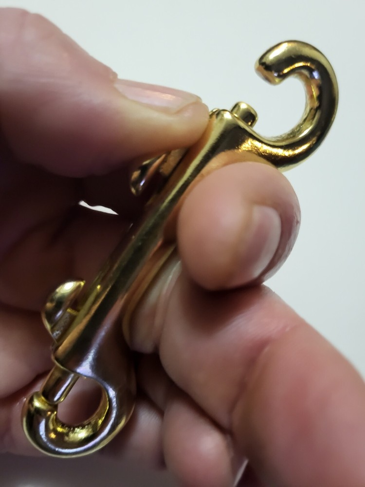 3 1/2" solid brass double sided snap hook. thumb release. leash lanyard