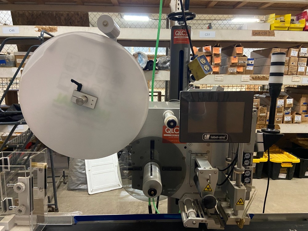 Label-Aire Model Labeling Machine with T-Base Applicator Stand and Conveyor