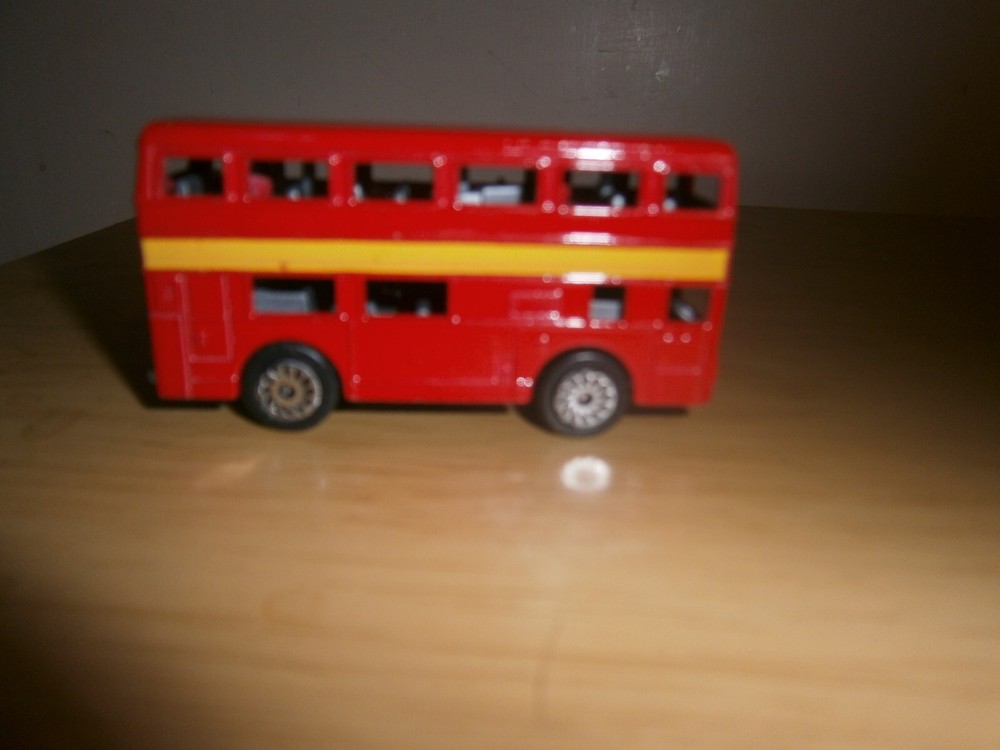 '7334' unbranded diecast red bus. China. 7.1cm. (E1c)