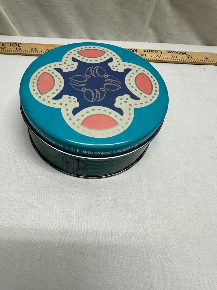 D. E. Wolfgang Candy Tin - 6 inch round