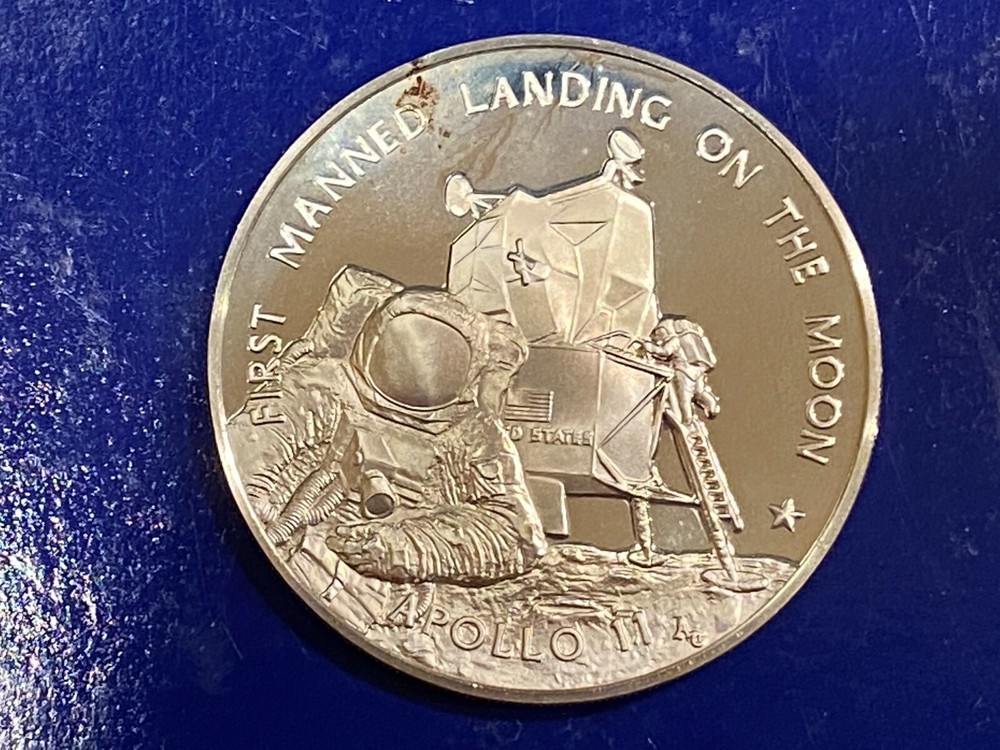 Three Commemorative coins/medals (Sterling, Silver, Bronze)