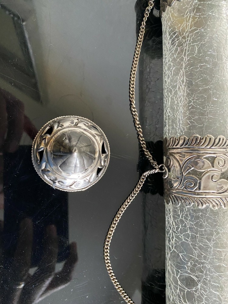 Middle Eastern pierced white metal scroll holders with broken glass effect