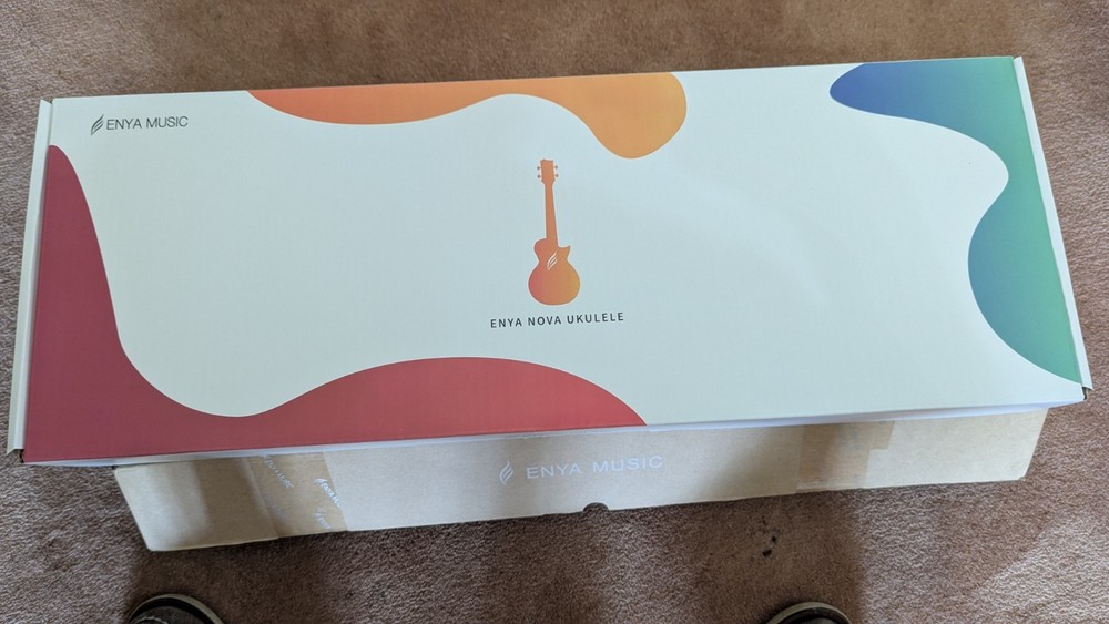 25" Ukulele With Case And Extra Strings