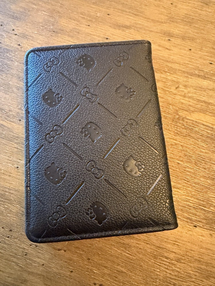 SOLD OUT embossed black Passport Holder Hello Kitty
