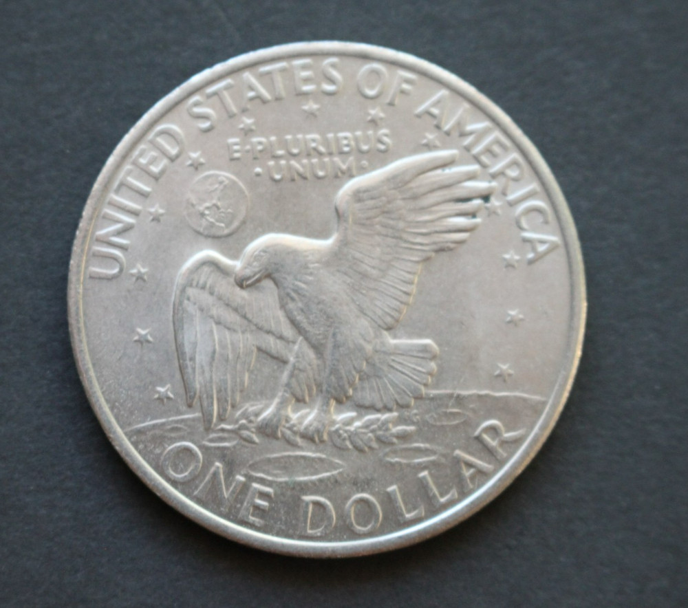 1971 D Eisenhower dollar/about uncirculated/doubled rim and edge error
