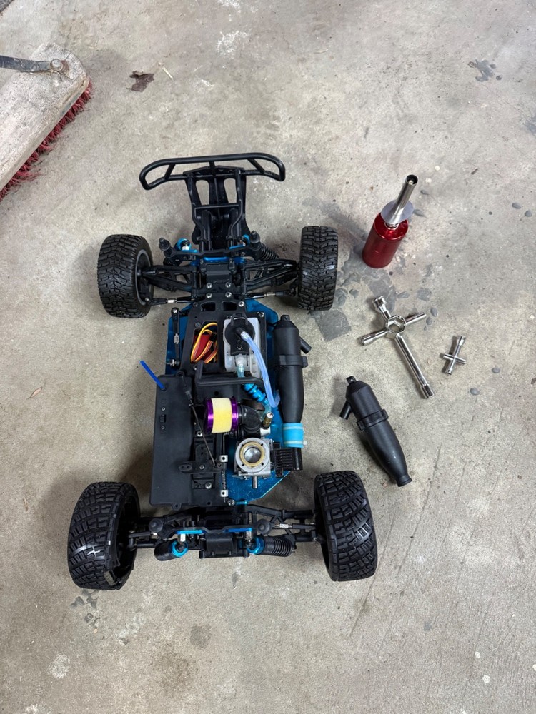 Nitro rc car the car does not run because the engine needs a head also needs a r