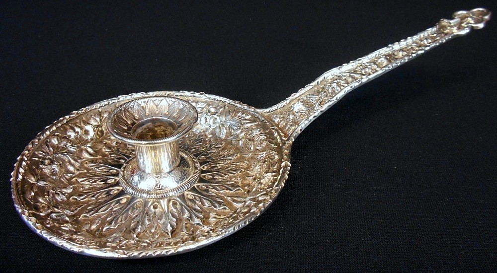 A rare repousse solid silver chamberstick, 11oz mark, S.Kirk & Son c.1886-96