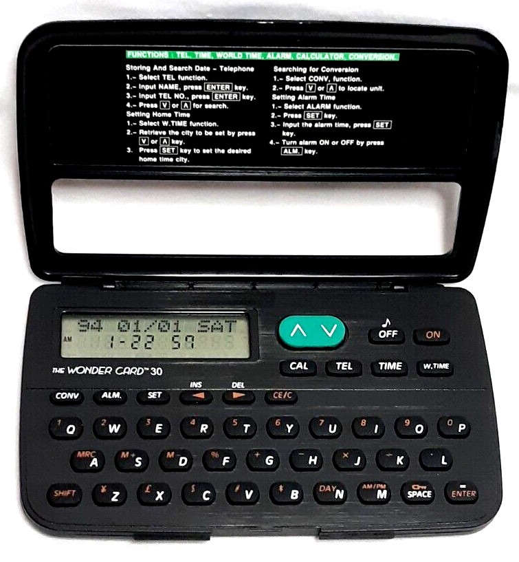 Vintage Electronic Organizer & Energizer CR2032 Battery