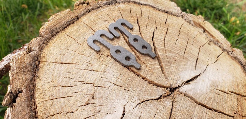 Titanium toggle button , double hook cord managment device
