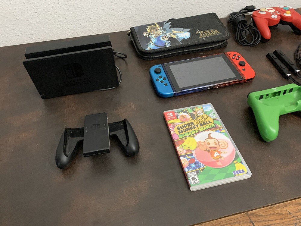 Nintendo Switch Console With A Bunch Of Stuff