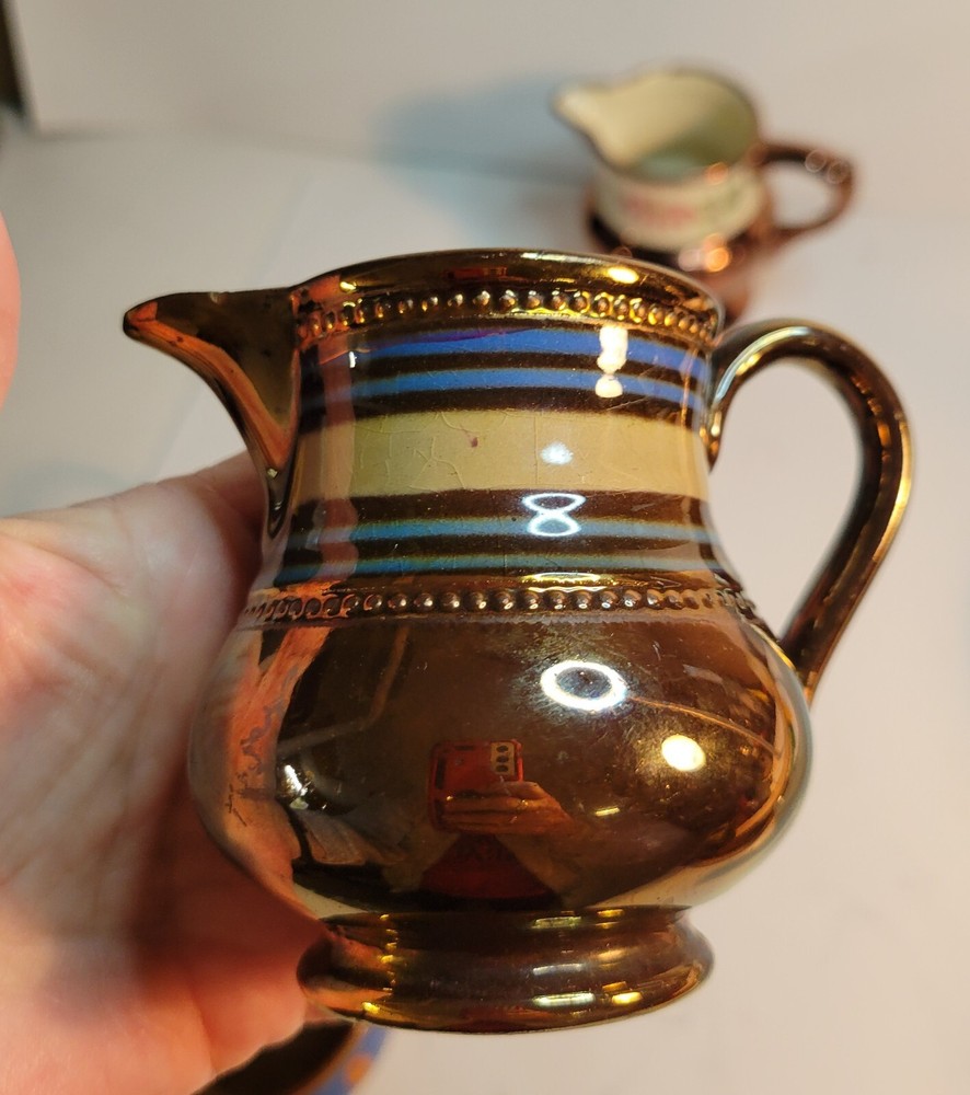 4 Pieces of Copper Lusterware 3 Small Pitchers & 1 Salt Cellar